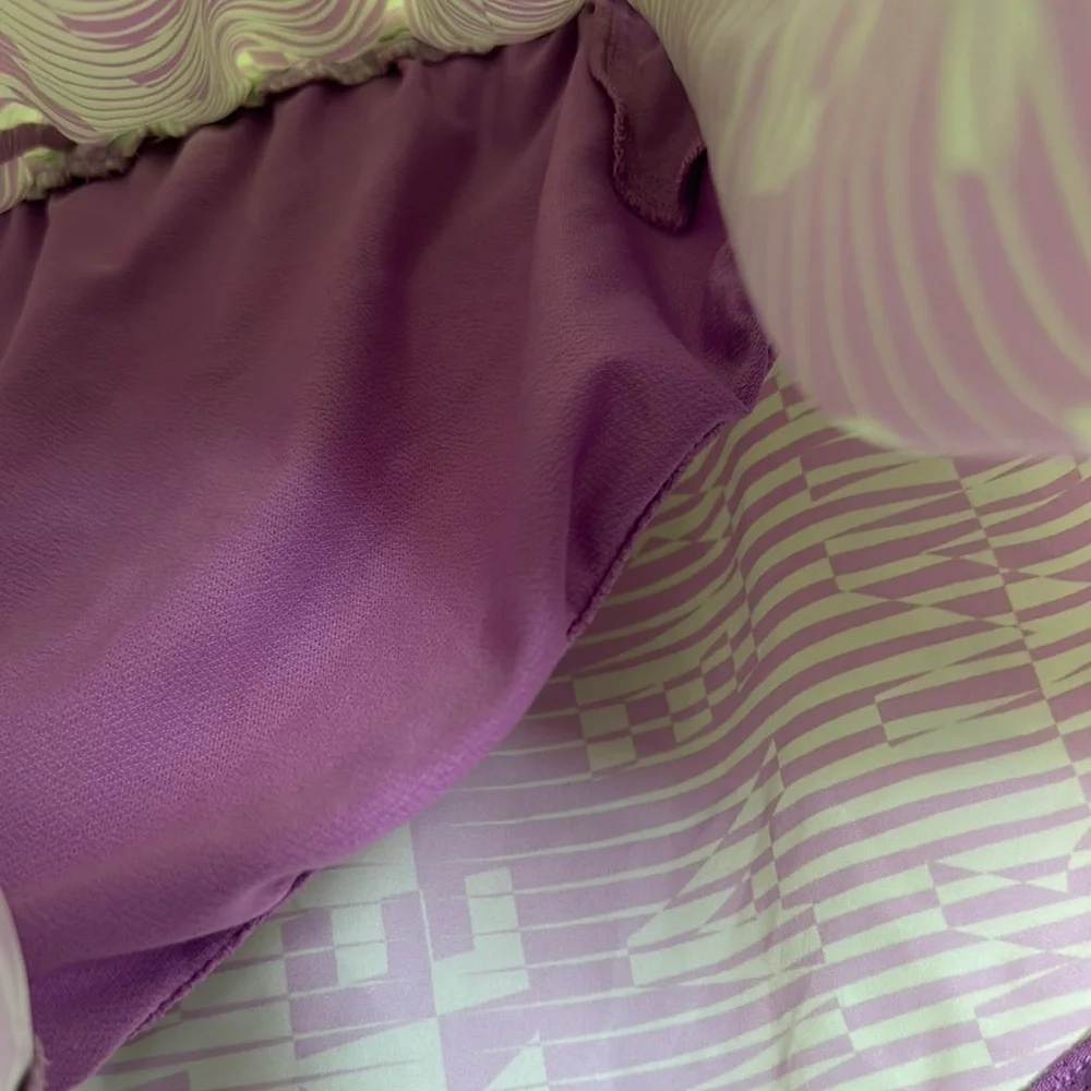 Nike Purple and Green Athletic Shorts with Dynamic Design